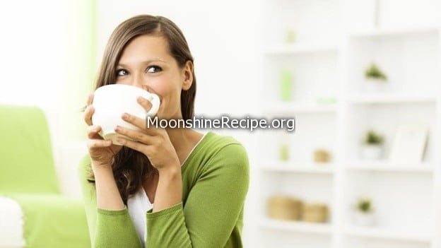 lady drinking from cup